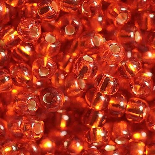 Бисер Preciosa 97030 темно-оранжевый прозрачный с серебряным центром